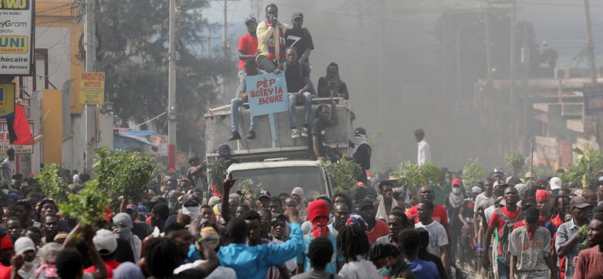 Haiti'de binlerce kişi hükümetin uluslararası asker talebini protesto etti